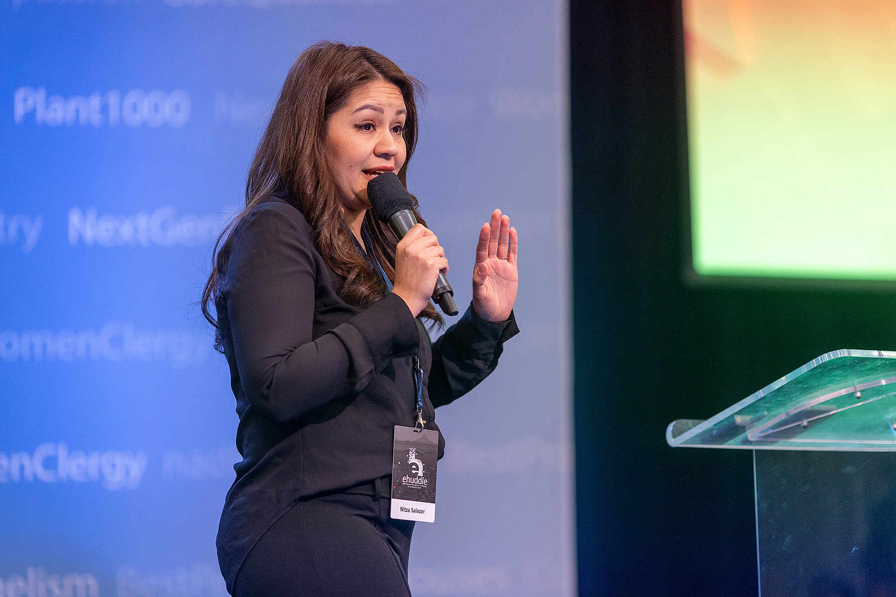 Hispanic woman gives a presentation