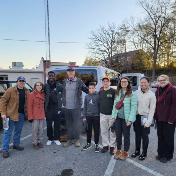 A group of students and sponsors are ready to leave Southern Adventist University's campus for their week of outreach.