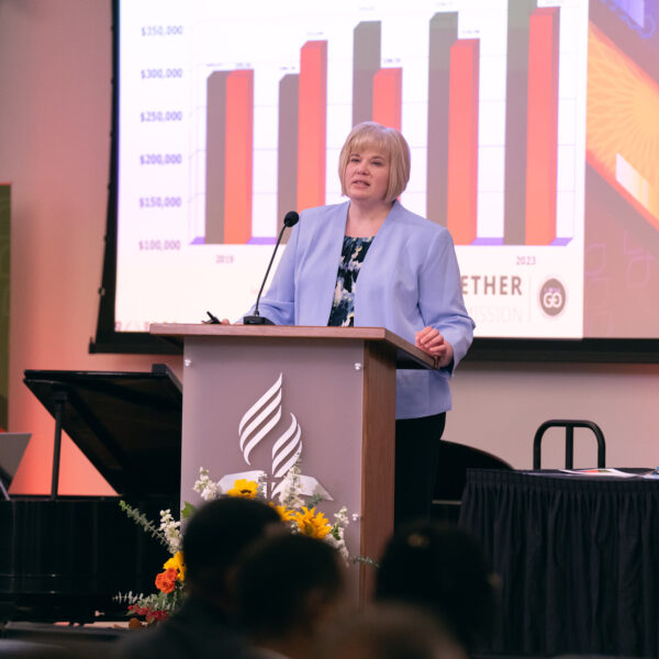 Businesswoman presents a powerpoint on finance before a work meeting.