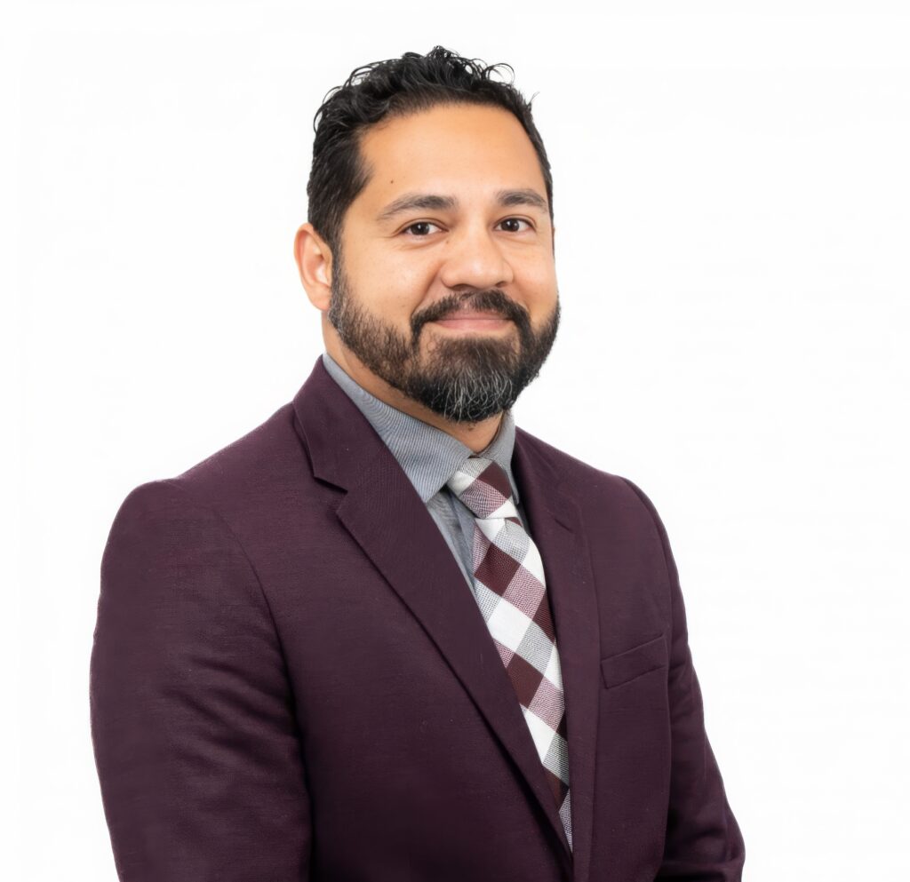 Photo of a man in suit with a white background