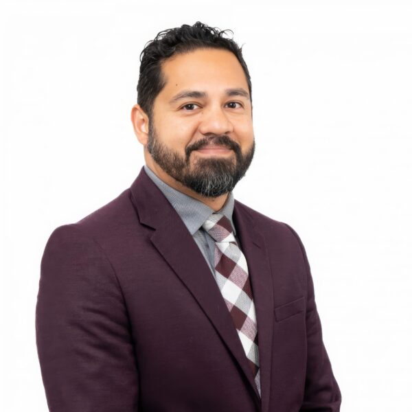 Photo of a man in suit with a white background