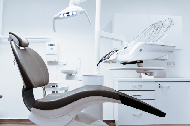 A photo of a dentist chair in a dental office