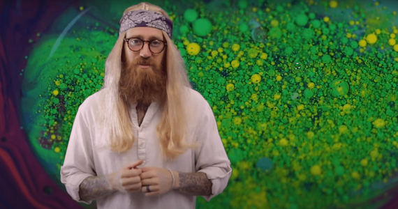 hippy narrator in front of psychedelic background