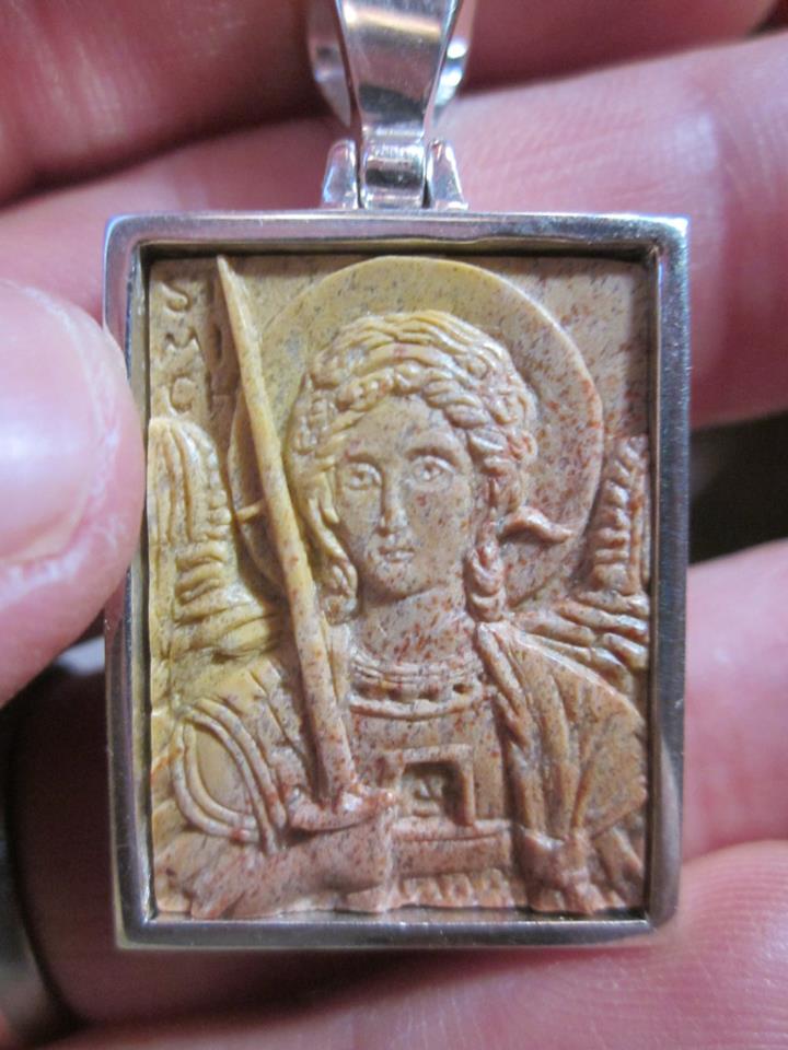Holy St. Michael the Archangel pendant by Jonathan Pageau carved from stone and set in sterling silver (2.5cm/1" high).