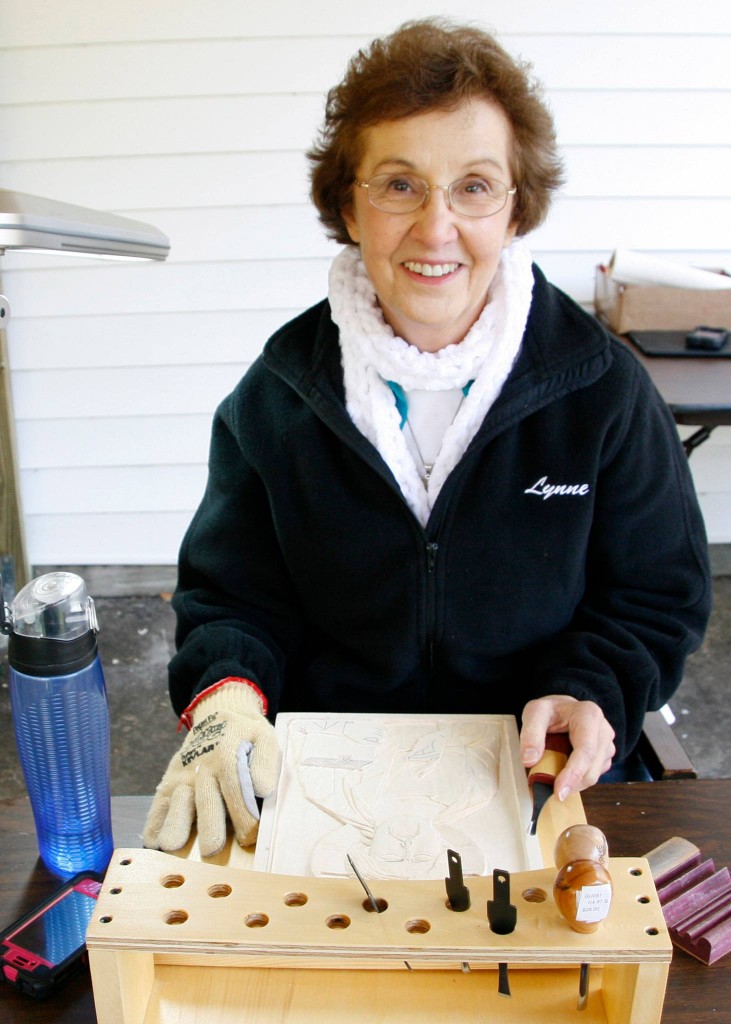 Lynne Attaway enjoying the hard work of carving full time for six days.