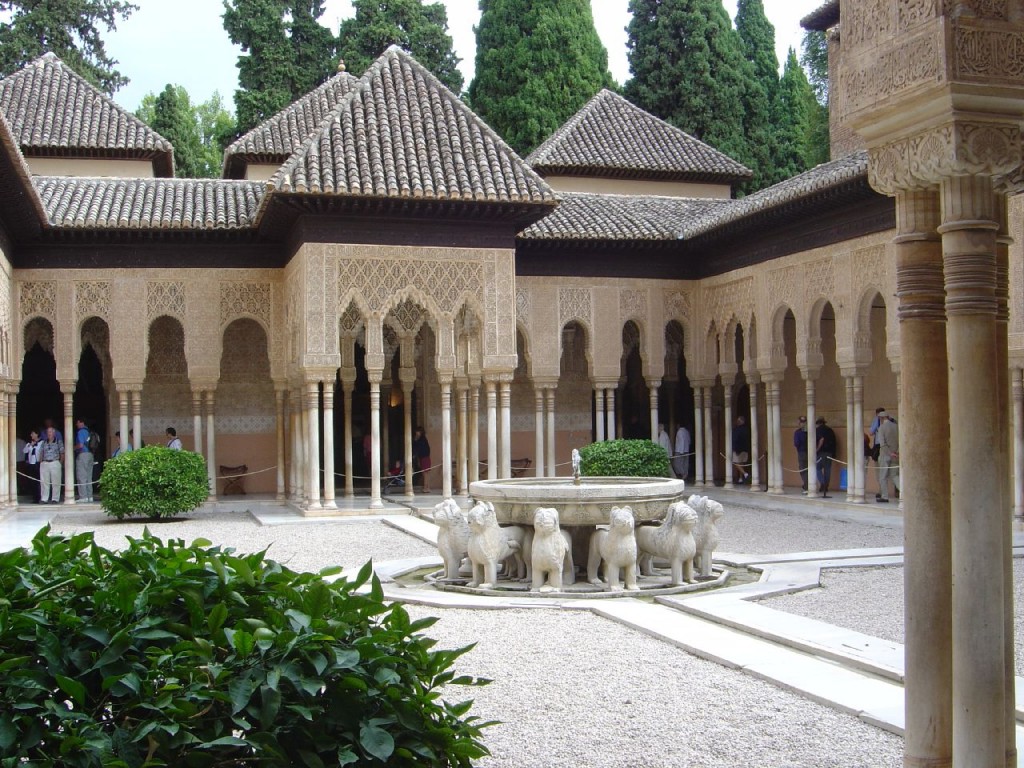 A paradise garden with central fountain feeding four water channels, Alhambra Palace, Granada, Spain. 14th century.