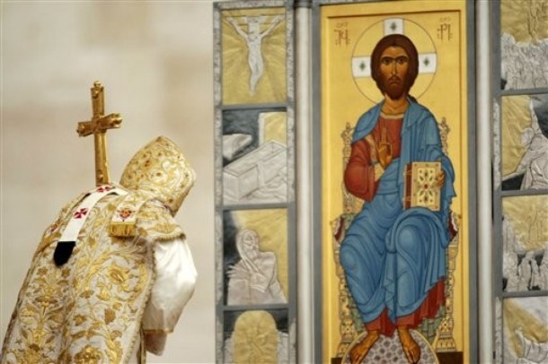 Pope Benedict XVI bowing before the new paschal icon.