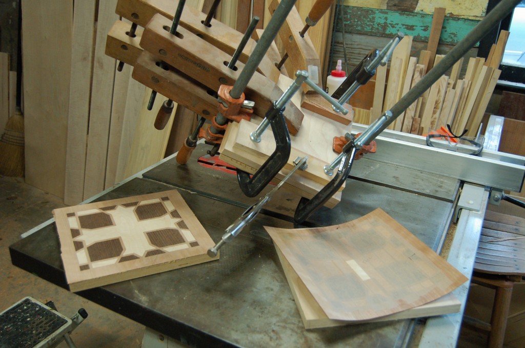 Gluing the marquetry faces for the chalice holder