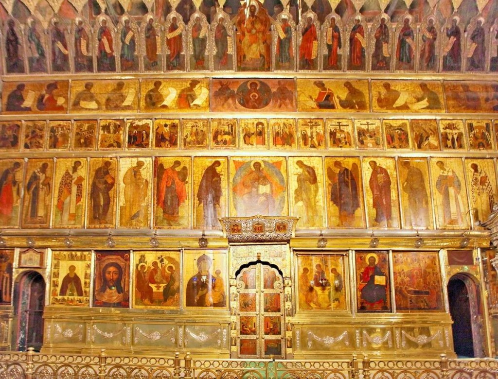 The 15th-century iconostasis in Holy Trinity Cathedral at Serguiev Possad, Russia. Typical of an early Russian screen, the structure between the icons is as discreet as possible.