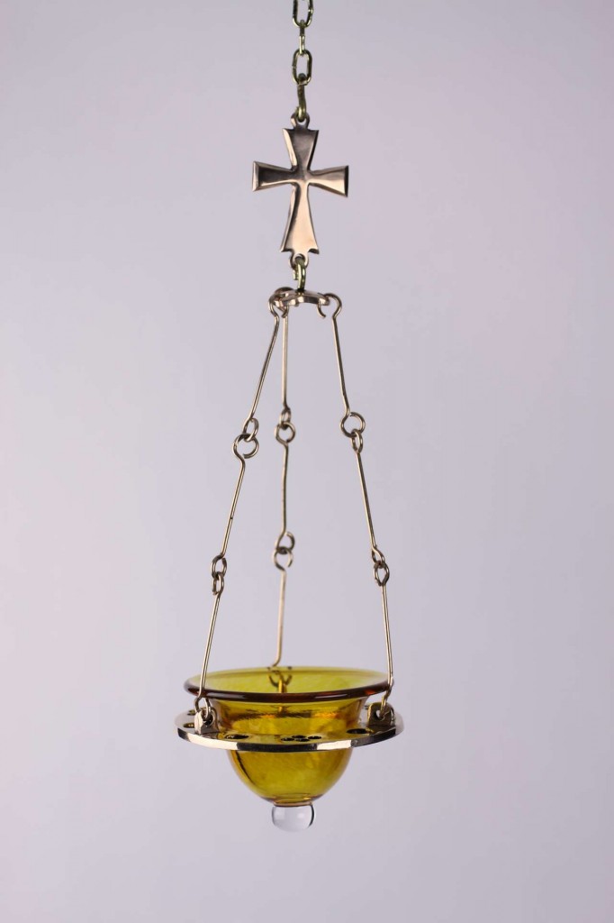 Contemporary brass oil lamp for private chapel, USA, made by the author, with hand blown tinted glass bowl. Design inspired by the illustrated Byzantine bronze lamp.