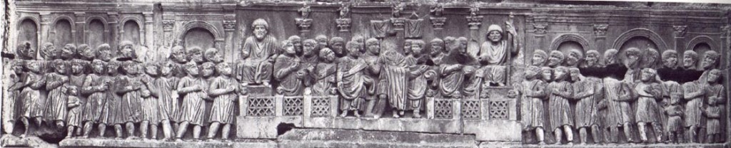 18. An example of Late Antique art, showing a more abstract arrangement of forms, such as vertical perspective. From the Arch of Constantine c. 320 AD,, Rome.