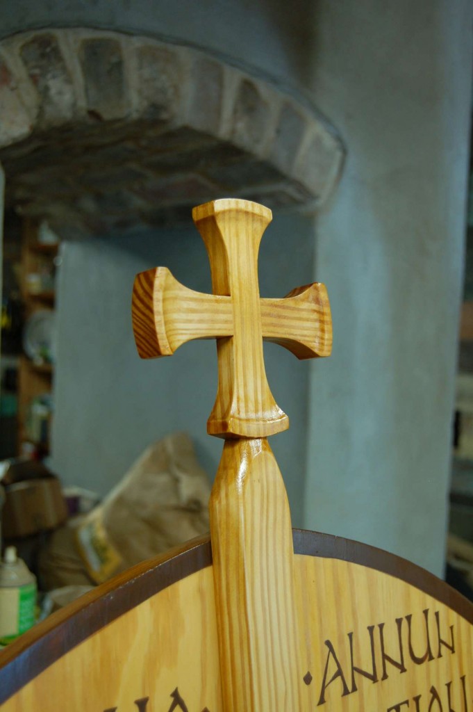The astragal and cross, carved by the author.