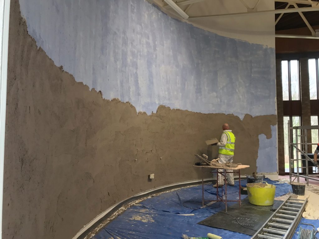 Preliminary coat of lime.