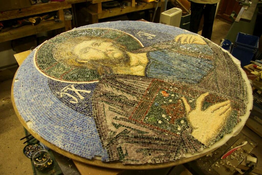 The back of the mosaic with lime putty removed, with the front side still stuck to the cloth