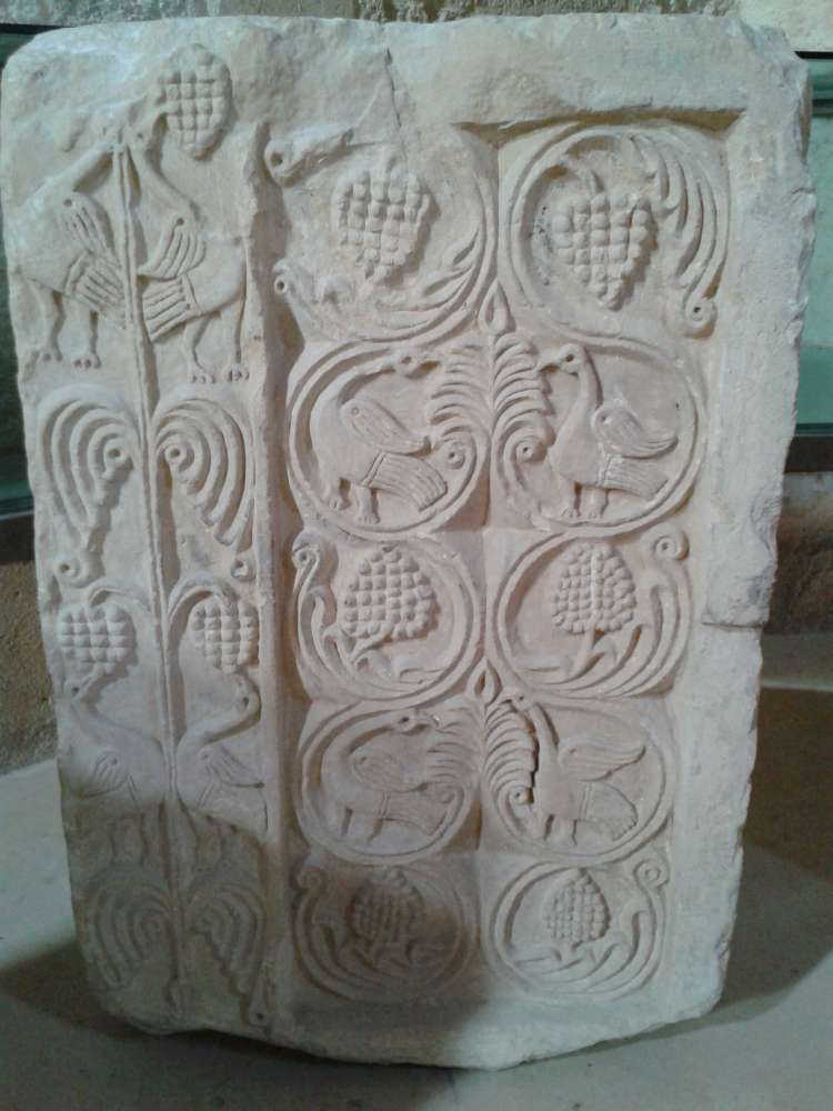An early Spanish carved stone, typical of the Byzantine-influenced architecture of the Visigothic period.