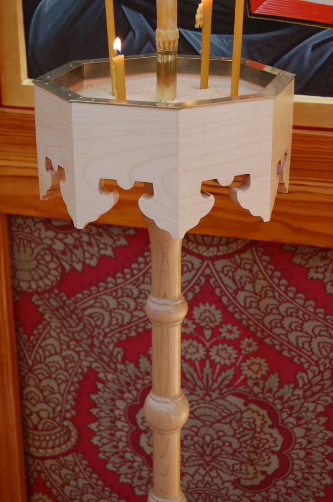 A candelabrum in the style of 17th-century Russian woodwork, with hand-cut fretwork. Made by the author.