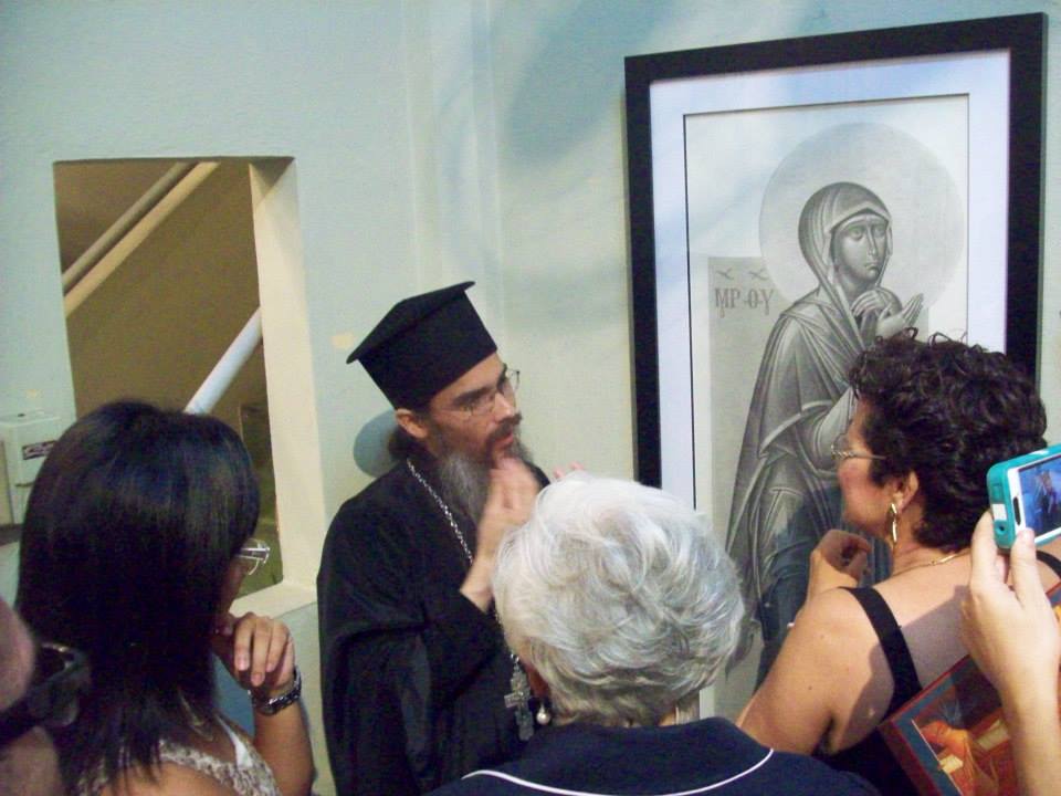 Opening night. Fr. Silouan explains icon to visitors