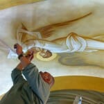 George Kordis painting the Fanerwmeni Church, Vouliagmeni, Greece.