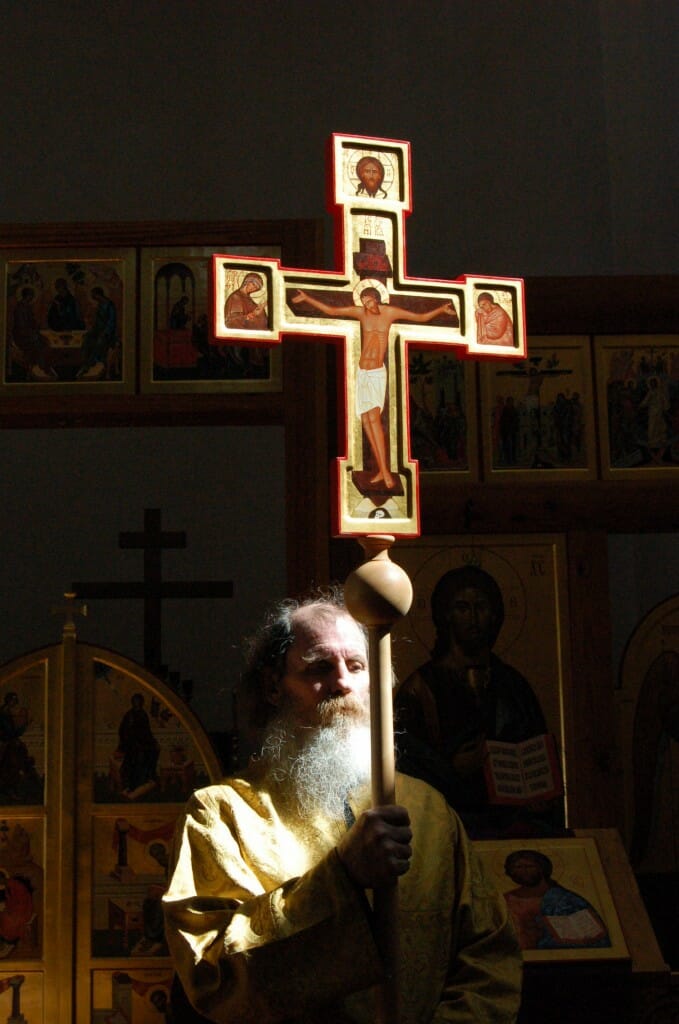 A painted wooden processional cross made by the author.