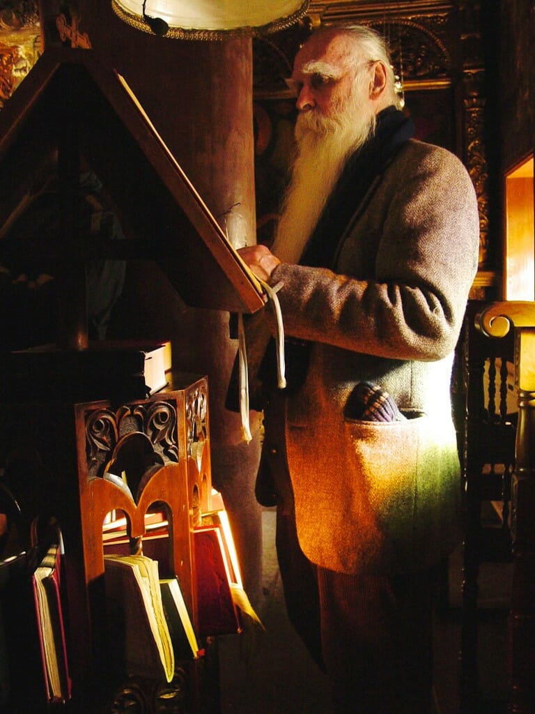Donald (Donatos) Sheehan standing at the reader's stand at the Monastery of Giromeri in Northern Greece.