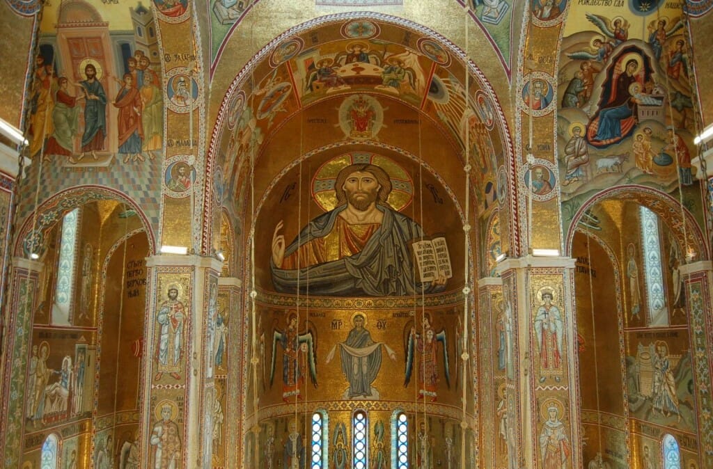 The Pantocrator apse mosaic, modelled upon that of the Palatine Chapel in Palermo.