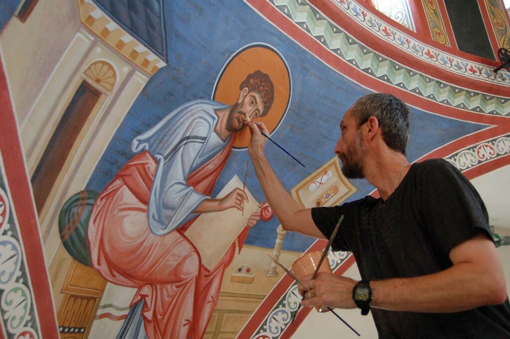 Vladimir Grygorenko painting the pendentives.