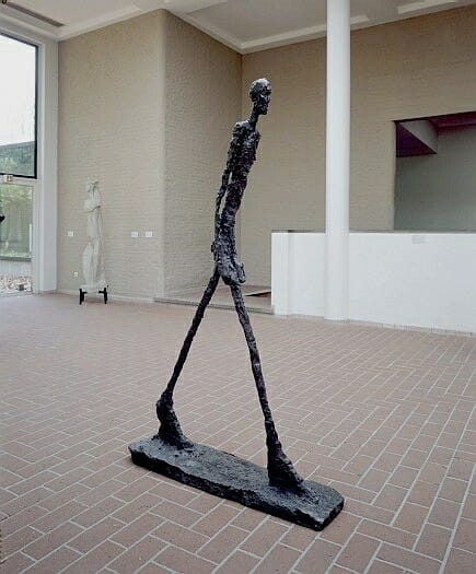 The Walking Man I. By Alberto Giacometti, 1960.