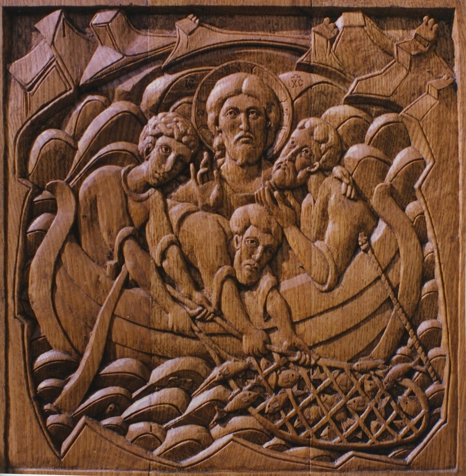 An oak carving of the miracle of fishes, Iviron Monastery, Mount Athos, by Aidan Hart. The design was adapted as the work was carved.