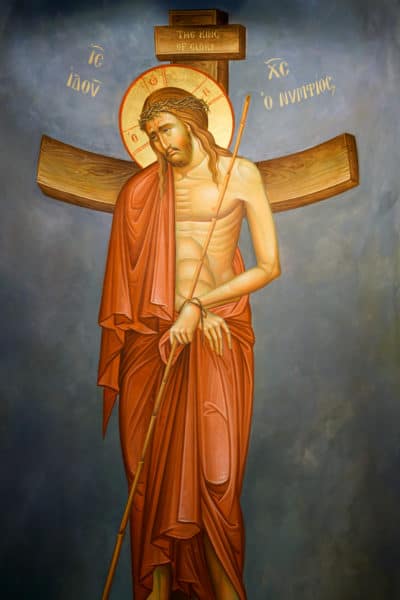 Christ standing before the Cross
