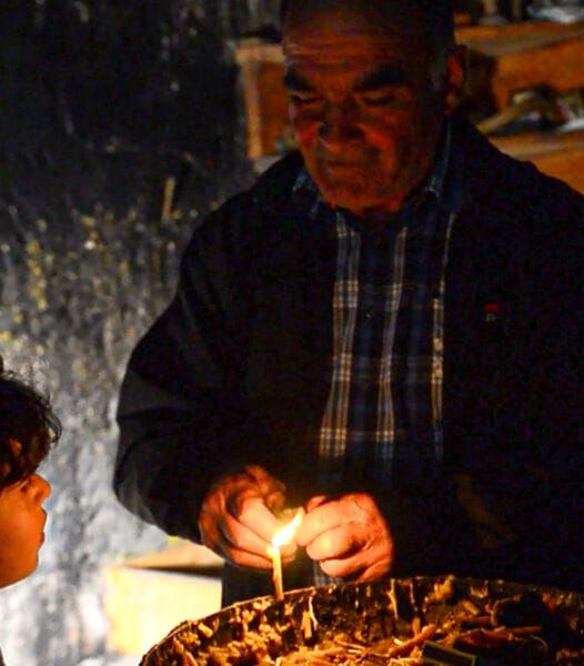 Svaneti churchkey keeper Yaroslav with his grand son.