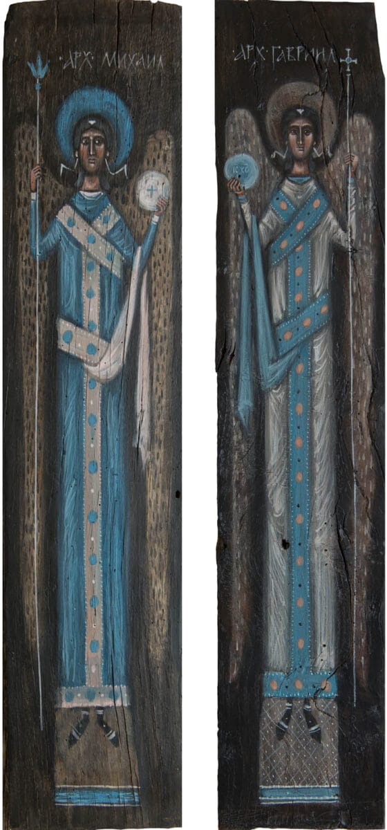 Archangels Michael and Gabriel by Olga Shalamova, 2022. Old wood, egg tempera.<br><br>I came across several pieces of old, worm-eaten wood, with cracks, chips, and even holes right through them. Even without any image on them, they were incredibly beautiful. The original shape of the boards determined the images themselves: the Archangels seem almost to have stretched to follow their form. Nothing was deliberately invented—I simply brought out what was already there in the material.