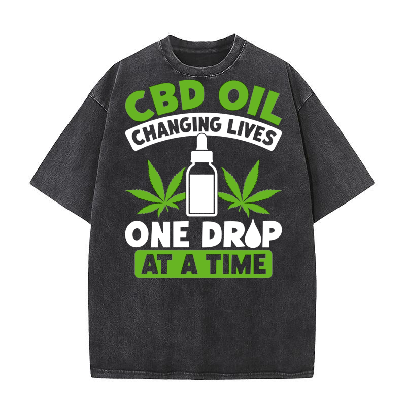 CBD OIL CHANGING LIVES ONE DROP AT A TIME Washed T-Shirt