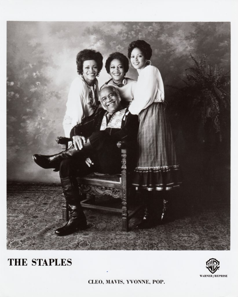 (Photo Left to right: Mavis, Cleotha and Yvonne Staples. Roebuck “Pops” Staples is seated. From their 1977 Warner Bros. Records LP “Family Tree.”)